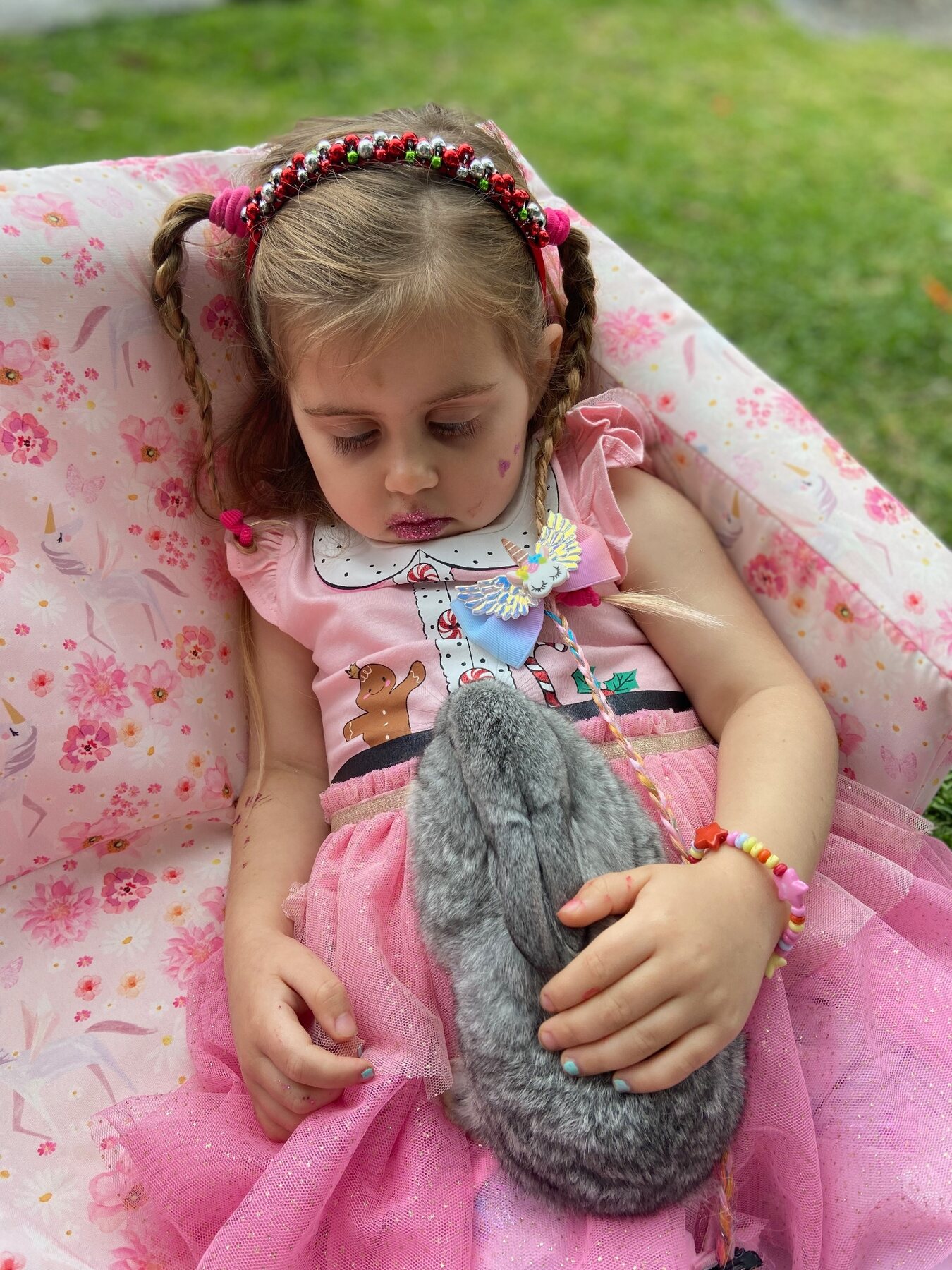 Flo resting with her grey bunny