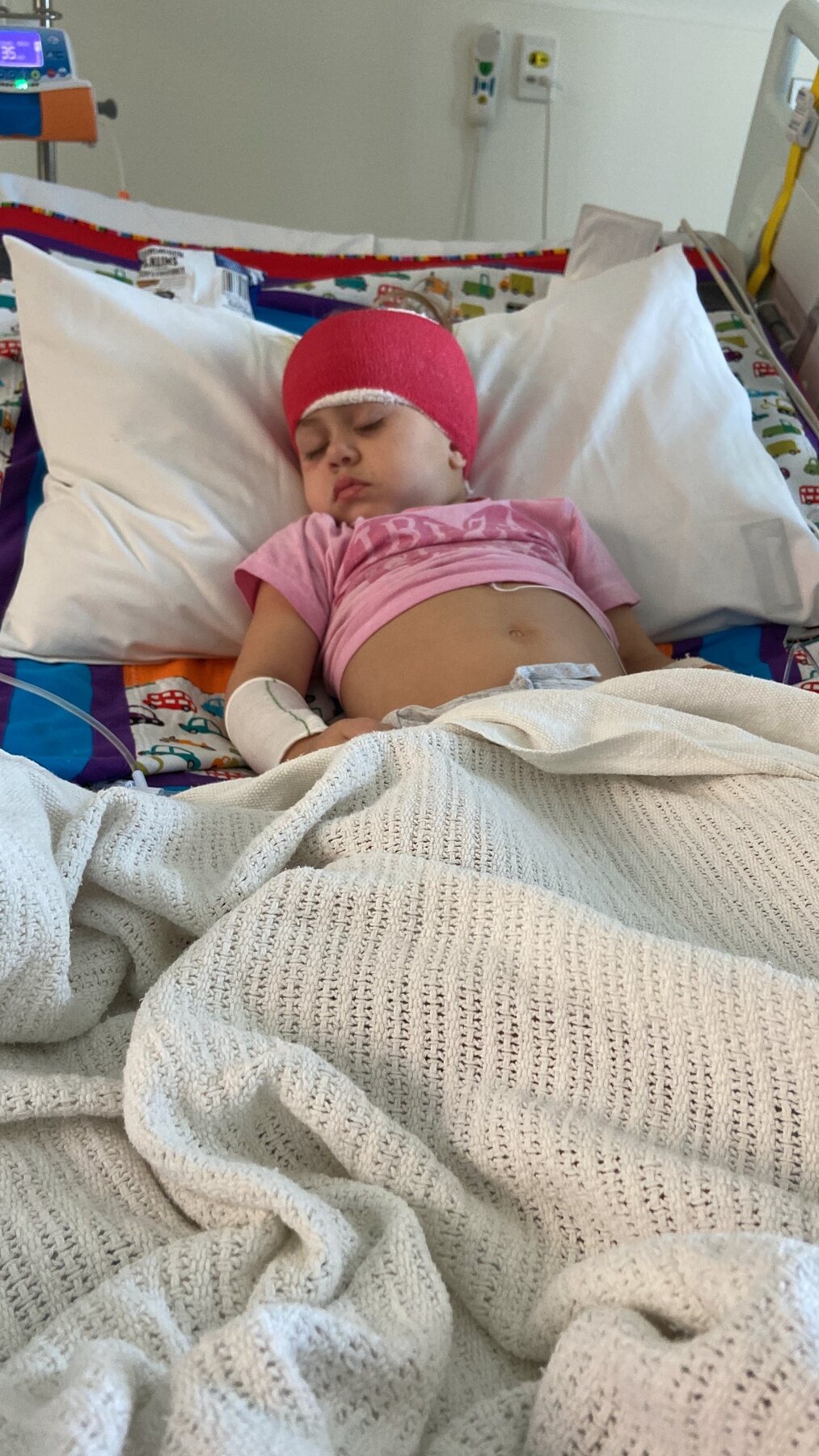 Flo resting in her hospital bed