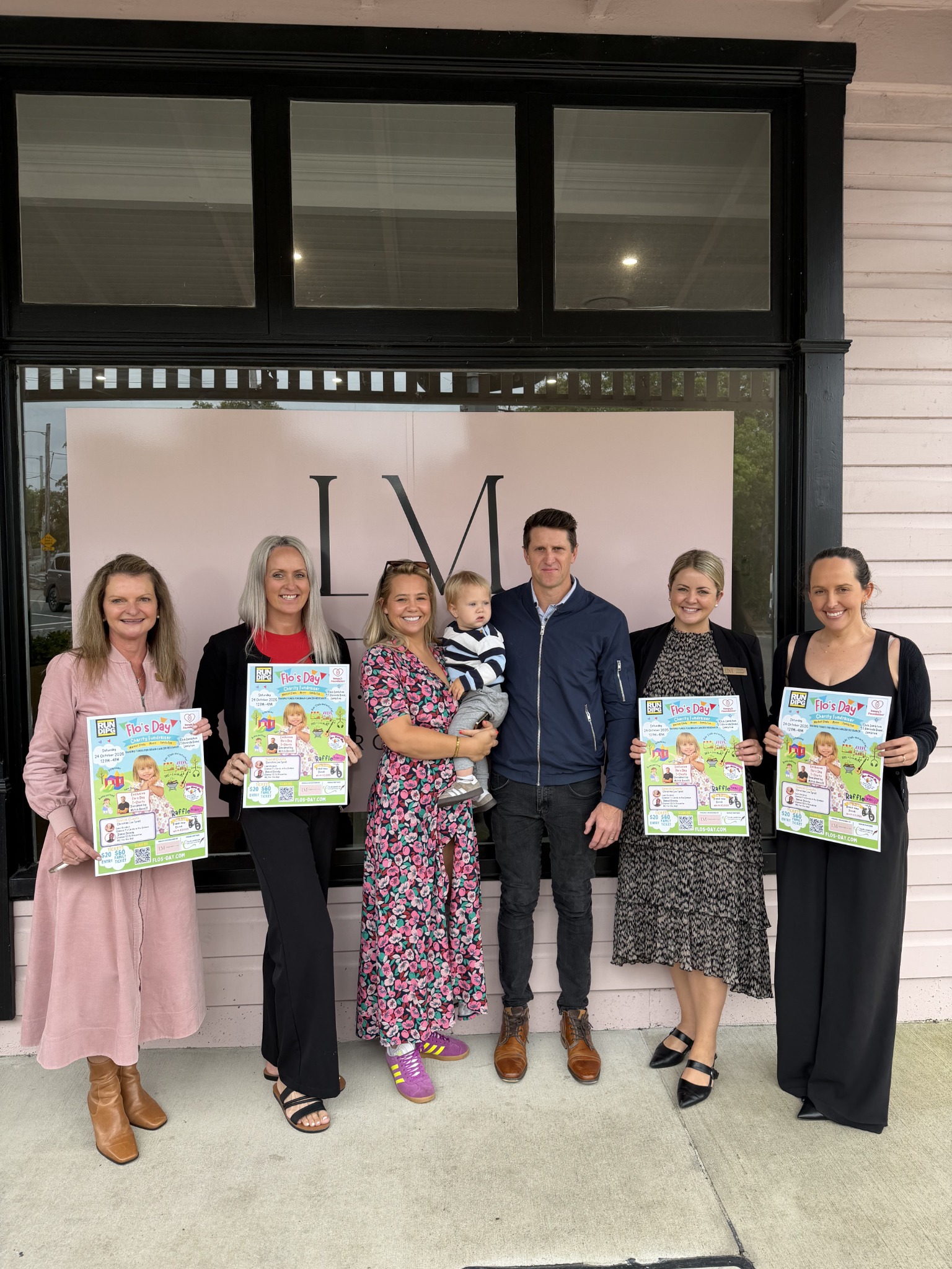 Michelle and Archie with Lisa Macklin and the LM Property Co. team outside their New Lambton office