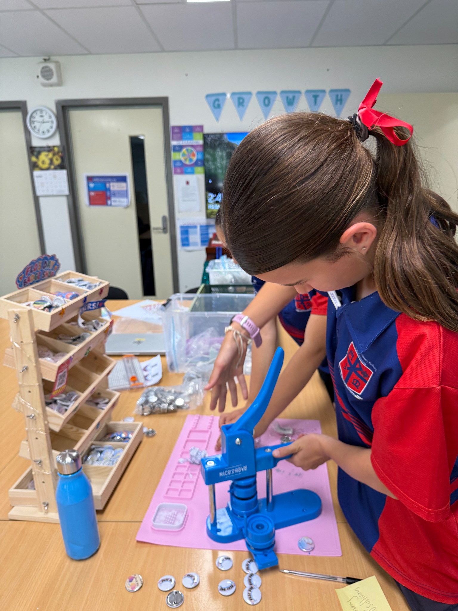 Young creators using the blue badge press together