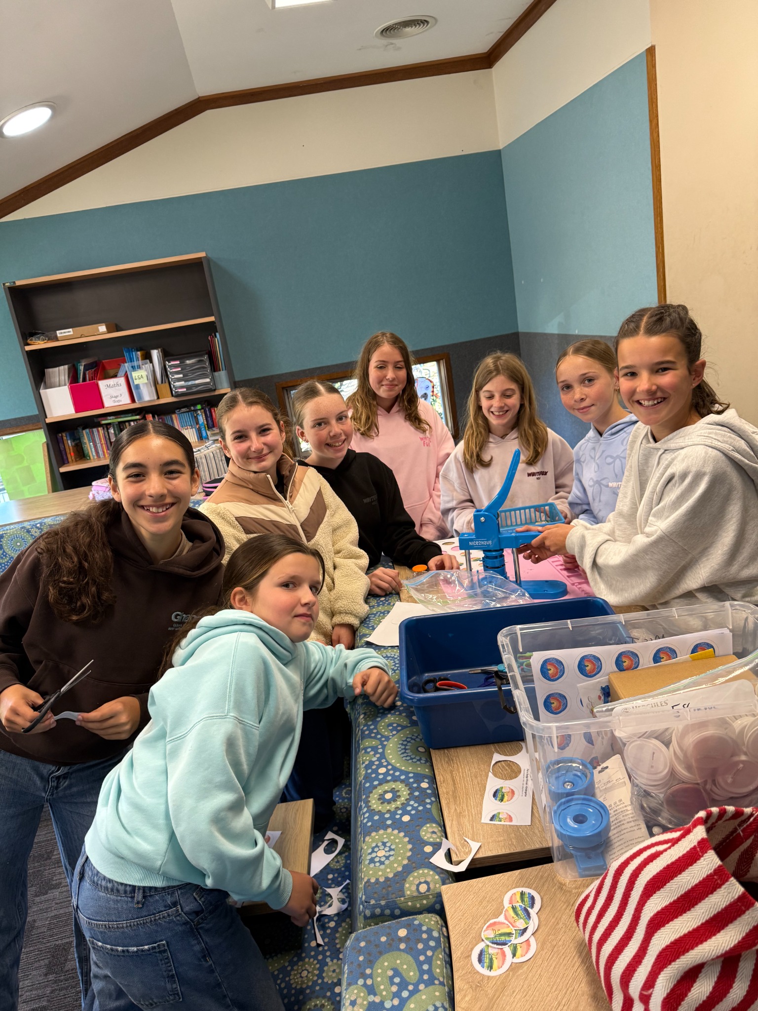 The Flo’s Day young creators gathered around their badge-making table